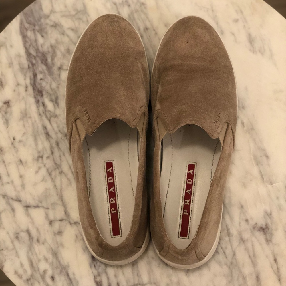 Tan suede Prada slip ons